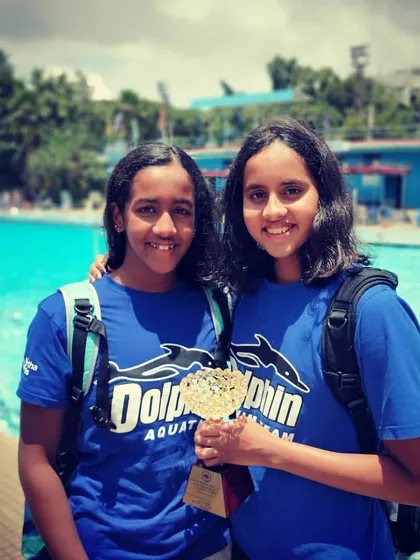 The smile of a champion. This student is proudly holding a trophy after a competition, a perfect example that consistent training and hard work truly pay off. We celebrate every victory, big or small.