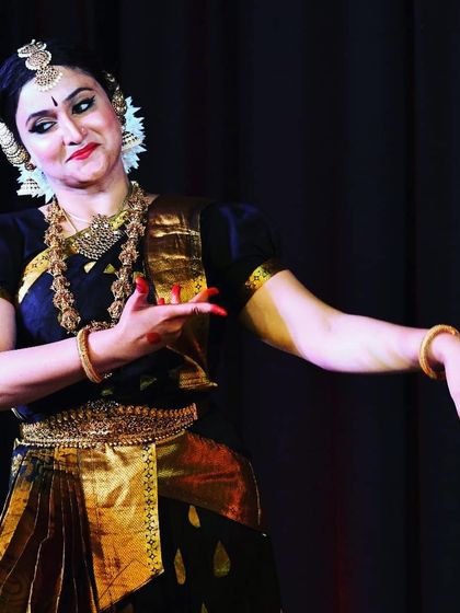 This image captures the essence of 'abhinaya' or facial expression in Bharatanatyam. Our training focuses on helping dancers connect emotionally with the stories they portray.