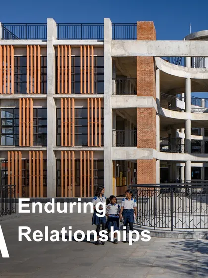 Enduring relationships are at the heart of our practice, with 70% of our clients working with us recurrently. This image of three students at Euro School represents the generations of learners who have grown in the spaces we've created.
