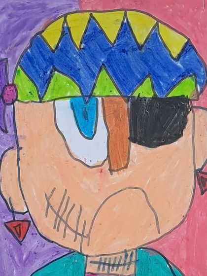 This pirate portrait by a preschooler shows how we introduce patterns and details. Notice the pattern on the bandana and the shape of the earring, all part of our ABCs of drawing.