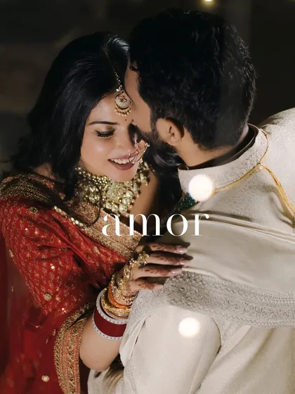 An intimate close-up of the couple sharing a tender moment. This portrait, titled 'Amor', focuses on the deep connection and emotion between them, highlighted by soft, romantic lighting that is a signature of our couple photography style.