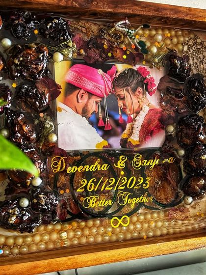 Another angle of the complete varmala preservation, showing the depth and texture created by preserving the entire garland within the resin.