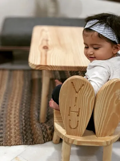 Seeing my little clients enjoy their furniture is the best feeling. This sweet girl is sitting in her very own bunny chair, which I personalized by engraving her name on the back. It’s handcrafted from natural pine wood and sized just for toddlers.