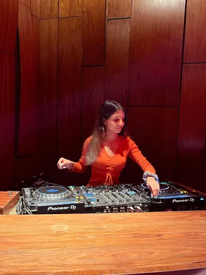 A final shot from my techno set, showing my hands on the controls of the Pioneer DJ setup.