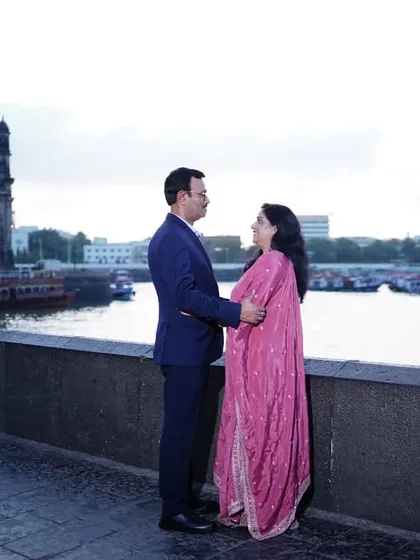 An elegant anniversary portrait with the iconic Gateway of India in the background, capturing a timeless Mumbai love story.