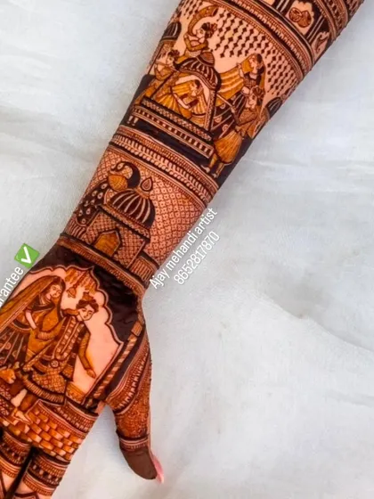 This design tells a story of a wedding ceremony. The bride and groom are shown exchanging garlands, a key moment captured forever in henna.