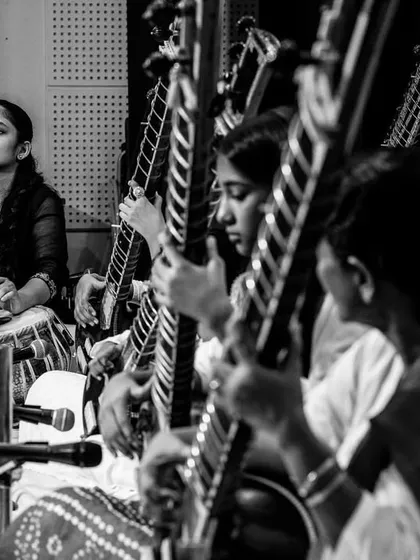 A focused black and white shot of my students during their performance at Guruvandan. You can see the concentration and dedication that goes into every note they play.