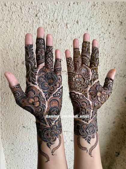 This is an example of my signature full-arm floral mehendi. I love creating dense, intricate patterns with elements like roses, paisleys, and detailed fillers to give you a rich and traditional look for any celebration.