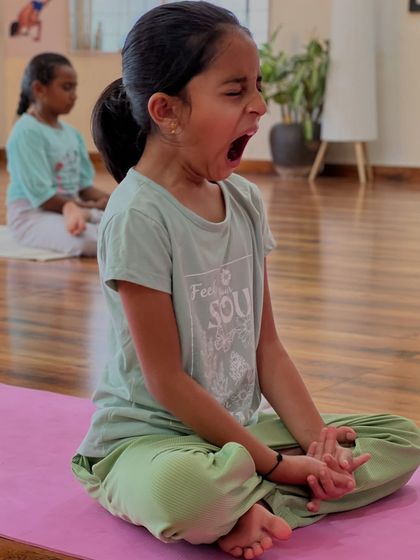A yawn during meditation practice is not a failure. It is the body releasing tension and fatigue. For children, learning to sit with these sensations without reacting is a powerful lesson in mindfulness and self-awareness.