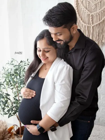 A warm embrace in my boho studio. The natural light and textures create a perfect setting for capturing the intimacy of a pregnancy journey.