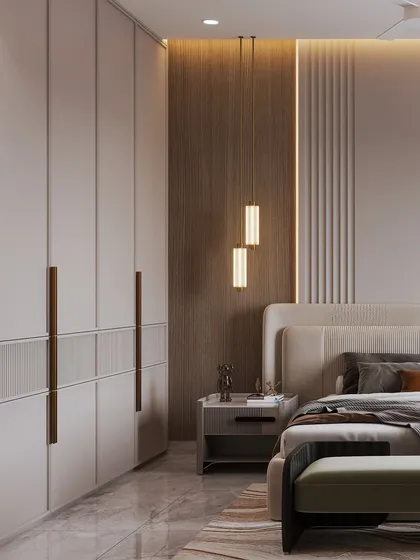 This angle shows the balance of materials, with the warm wood paneling behind the bed contrasting with the cool, neutral tones of the wardrobe.