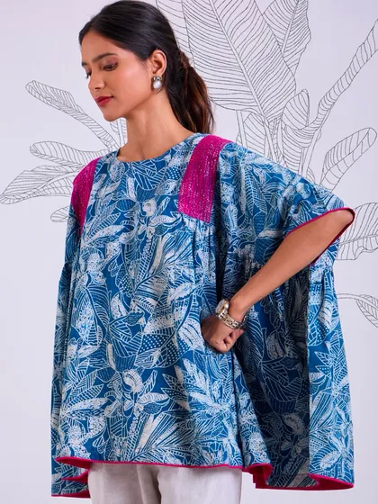 This image captures the airy, comfortable fit of our Chaaya oversized top. Made from 100% cotton and hand-block printed, it's a piece you'll reach for again and again.