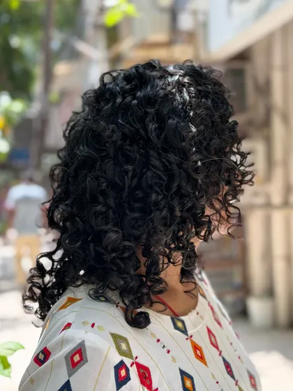 More examples of my short curly haircuts, from bobs to layered chops, each one personalized to the client's curl pattern and face shape.
