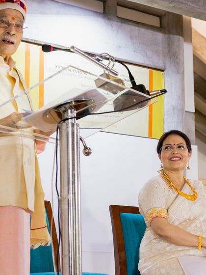 A joyful moment from one of our events. My father, Dr. Murli Manohar Joshi, is speaking, and I am listening with pride and gratitude.