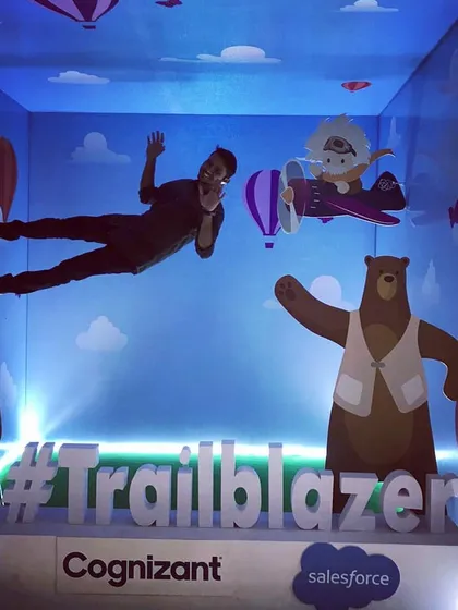 We create mind-bending photo opportunities like this anti-gravity room for a Cognizant and Salesforce event. These custom-built installations produce highly shareable photos that defy gravity, putting your guests and your brand at the center of a unique, memorable experience.
