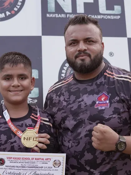Me with Anurag after his gold medal win at the Navsari Fighting Championship. We celebrate every victory, big or small, as a step towards greatness.