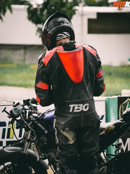 A rider prepares for a session on the track. Getting into the right mindset is just as important as the physical technique, and we ensure every student is ready before they head out.