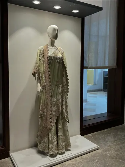 A beautiful Anamika Khanna creation on display. The soft color and intricate embroidery are perfect for a sophisticated daytime wedding or reception.