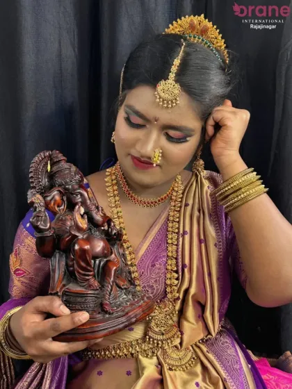 Another angle of the Gowri Ganesha festive look, showing the secure and elegant traditional updo. We teach our students how to create durable hairstyles that last throughout long events.