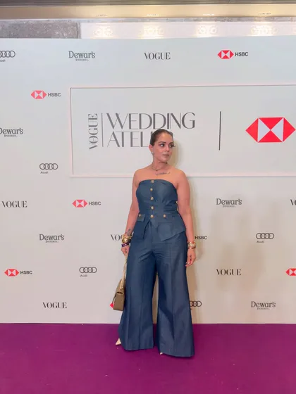 Attending the Vogue Wedding Atelier in a structured denim jumpsuit. This outfit is all about confidence, proving that the right fit and a powerful silhouette can make a statement at any high-profile fashion event.