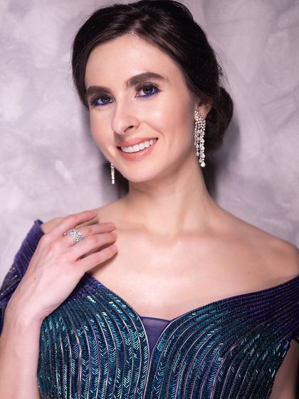 A happy and confident smile from our model, showing how a great makeup look can make you feel amazing.