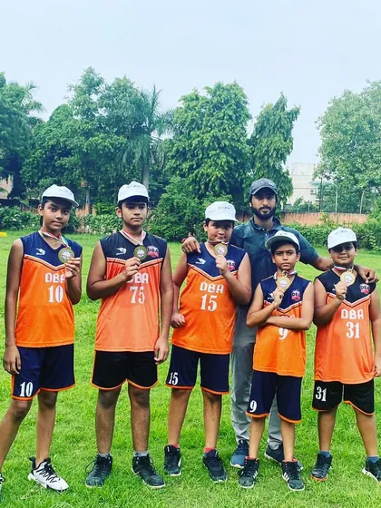 Our junior team celebrating with their gold medals after winning the Sunriseville School tournament. Teamwork makes the dream work.