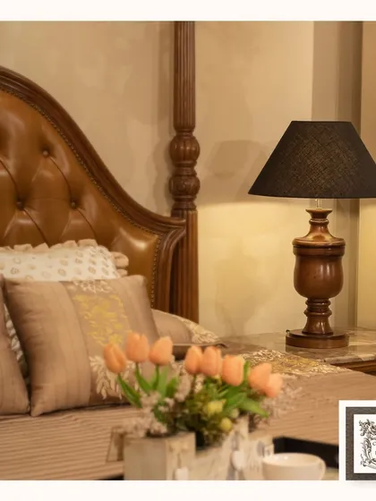 A bedroom should be a sanctuary, and this four-poster bed with a tufted leather headboard creates just that. The rich wood and classic design provide a sense of grandeur and comfort for a truly restful space.