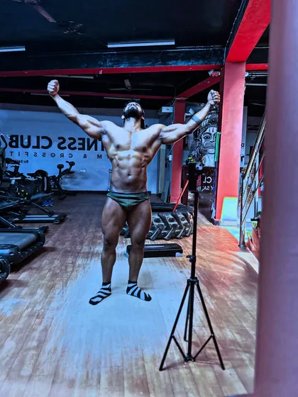 Chapter 3 begins. A powerful "victory" pose, showing a shredded and conditioned physique. Ready for the next challenge.