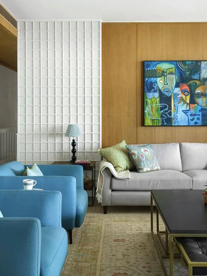 The living area of the Ivy Nest was designed to encapsulate the family's warmth and personality. The space has a cozy, lived-in feel, with a mix of furniture from various high-end and artisanal brands.