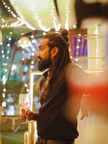 Taking a moment to enjoy the ambiance. It's important to feel the vibe of the party to know how to elevate it.