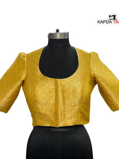 This golden brocade blouse is available for bulk orders. If you want to manufacture ready-made garments, my Mumbai-based factory is here to help.