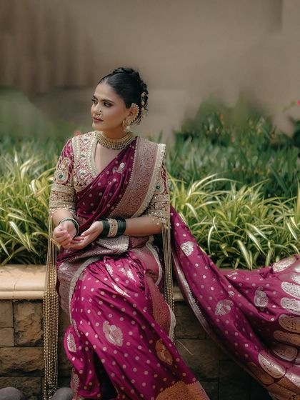 A tribute to the timeless beauty of the Maharashtrian bride. Dressed in a designer Nauvari saree, Shraddha looks like a true Maharani, with a look that is bold, radiant, and rooted in tradition.