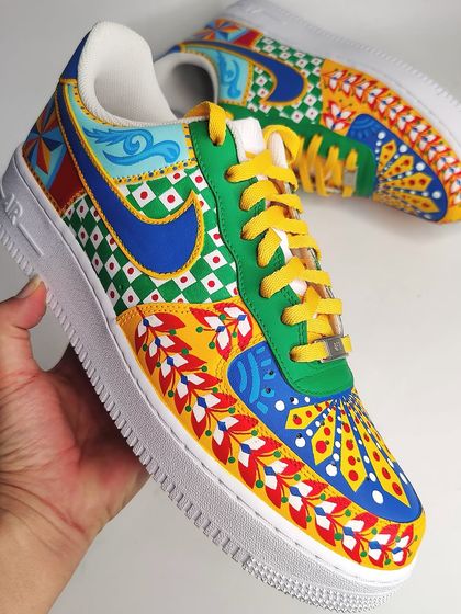 A close-up shot of the hand-painted Indian folk art patterns on the AF1s. The precision in the lines and dots is a testament to the hours of work that go into each pair.
