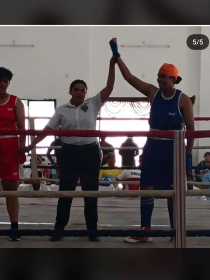 A win in the ring at the Youth Women State Championship in Nagpur. This is the moment all the training pays off, getting your hand raised as the winner.