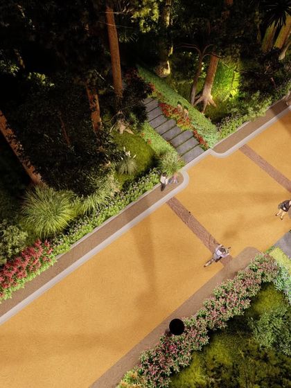 Another perspective of the night-time lighting concept, focusing on how light and shadow interact with the dense foliage and hardscape elements.