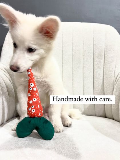 Each carrot toy is handmade with care. This close-up shows the detailed stitching and quality craftsmanship that goes into every piece.