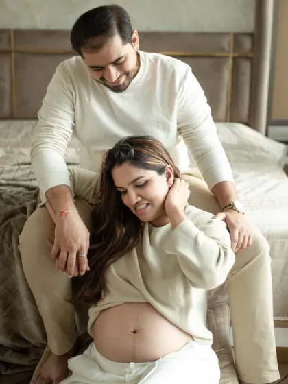 A relaxed and intimate portrait taken in a bedroom setting. These lifestyle shots feel authentic and capture the comfort and love you share in your own space.
