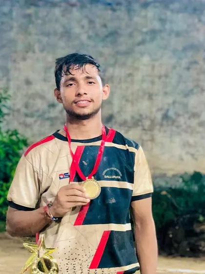 One of our players with his gold medal from the Ujada Modinagar tournament.
