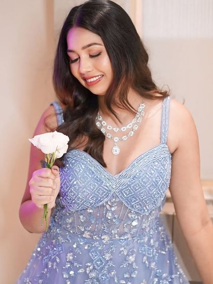 This glow is all about enhancing her story, not changing it. A soft and radiant makeup look that lets her natural beauty shine through, perfect for an elegant evening celebration.