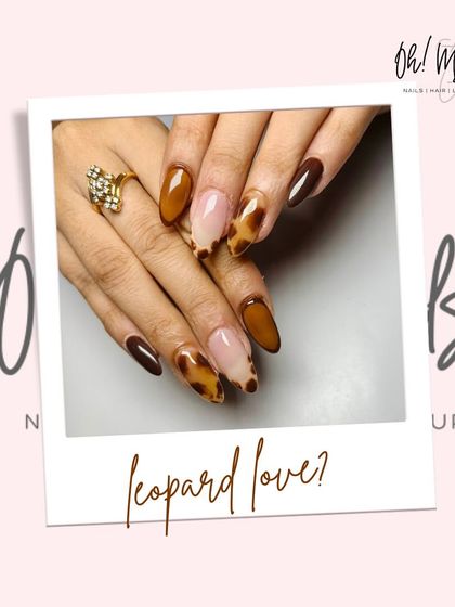 Roar into the season with style. This bold design features a mix of solid brown and mustard tones with accent nails showcasing a classic leopard print.