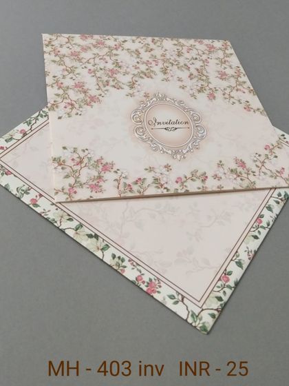 This budget-friendly invitation features a lovely pink floral chintz pattern. It's a sweet and charming choice for a garden party or daytime wedding.