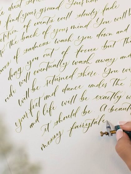 Calligraphy is a way for me to write my own story. Here, I am using an oblique pen and green ink to practice my script on high-quality paper. This is the kind of personal, expressive art you can create after learning the fundamentals.