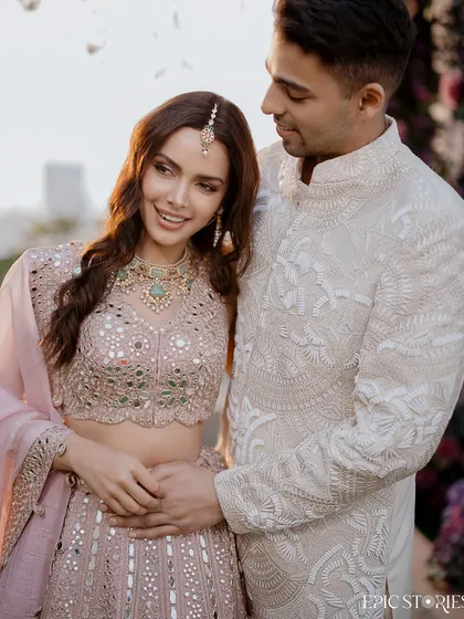 A sweet moment from Shazahn Padamsee and Ashish's intimate roka ceremony. Their gentle embrace and happy smiles perfectly capture the excitement and promise of a new beginning.