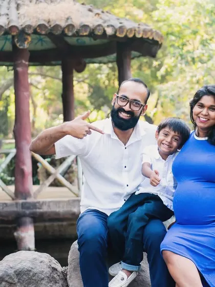 "Oops, we did it again!" This fun family photo perfectly captures the happy chaos and excitement of expecting baby number two.