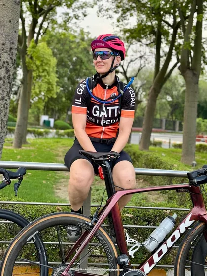 A rider taking a break, looking strong and passionate.