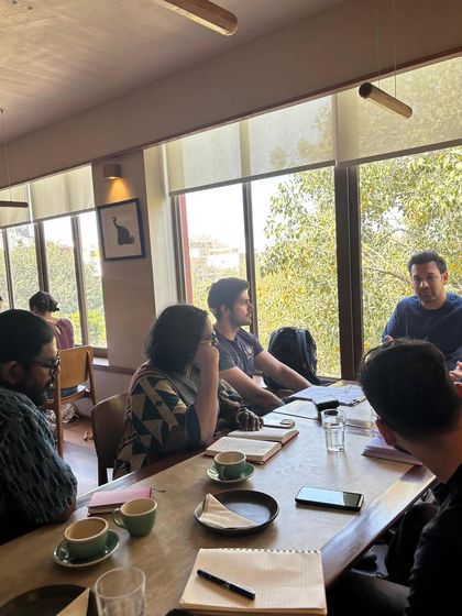 Engaged minds during our cafe entrepreneurship class. We focus on providing practical, actionable knowledge that students can apply directly to their business plans.