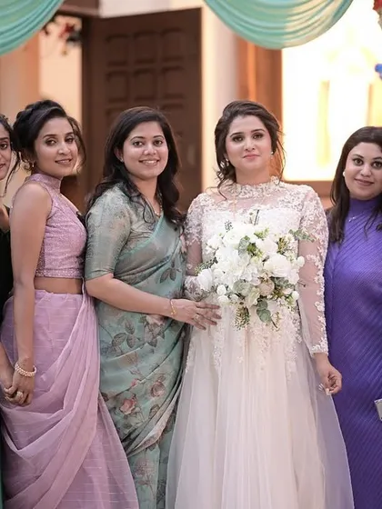 The bride with her lovely bridesmaids. I created a cohesive, elegant look for the entire bridal party.