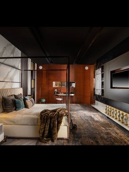 Part of our QUATTRO bedroom collection, this modern wall unit integrates a TV niche and concealed storage for a clean, clutter-free look. It sits opposite an elegant four-poster bed, creating a balanced and functional space.