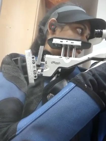 An athlete participates in an online training session from her home. We have adapted our coaching methods to ensure high-quality instruction, no matter the location.