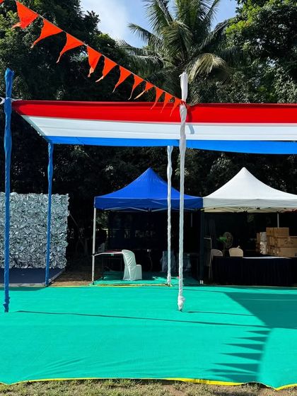 Another angle of the Kukdukoo Pune setup, showcasing a photo-op backdrop and neatly arranged vendor stalls. My service ensures that every part of the festival grounds is utilized effectively and looks professional.